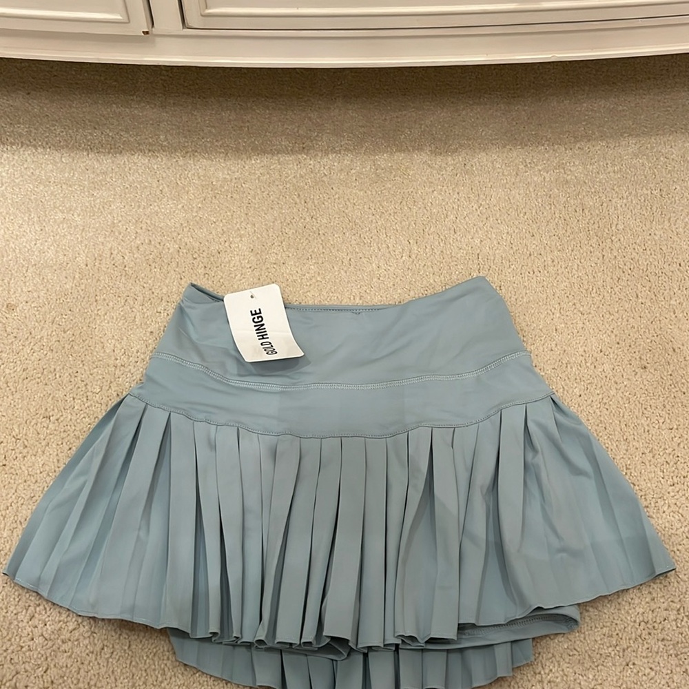 Gold hinge green tennis skirt